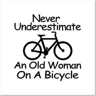 never understimate an old woman on a bicycle black Posters and Art